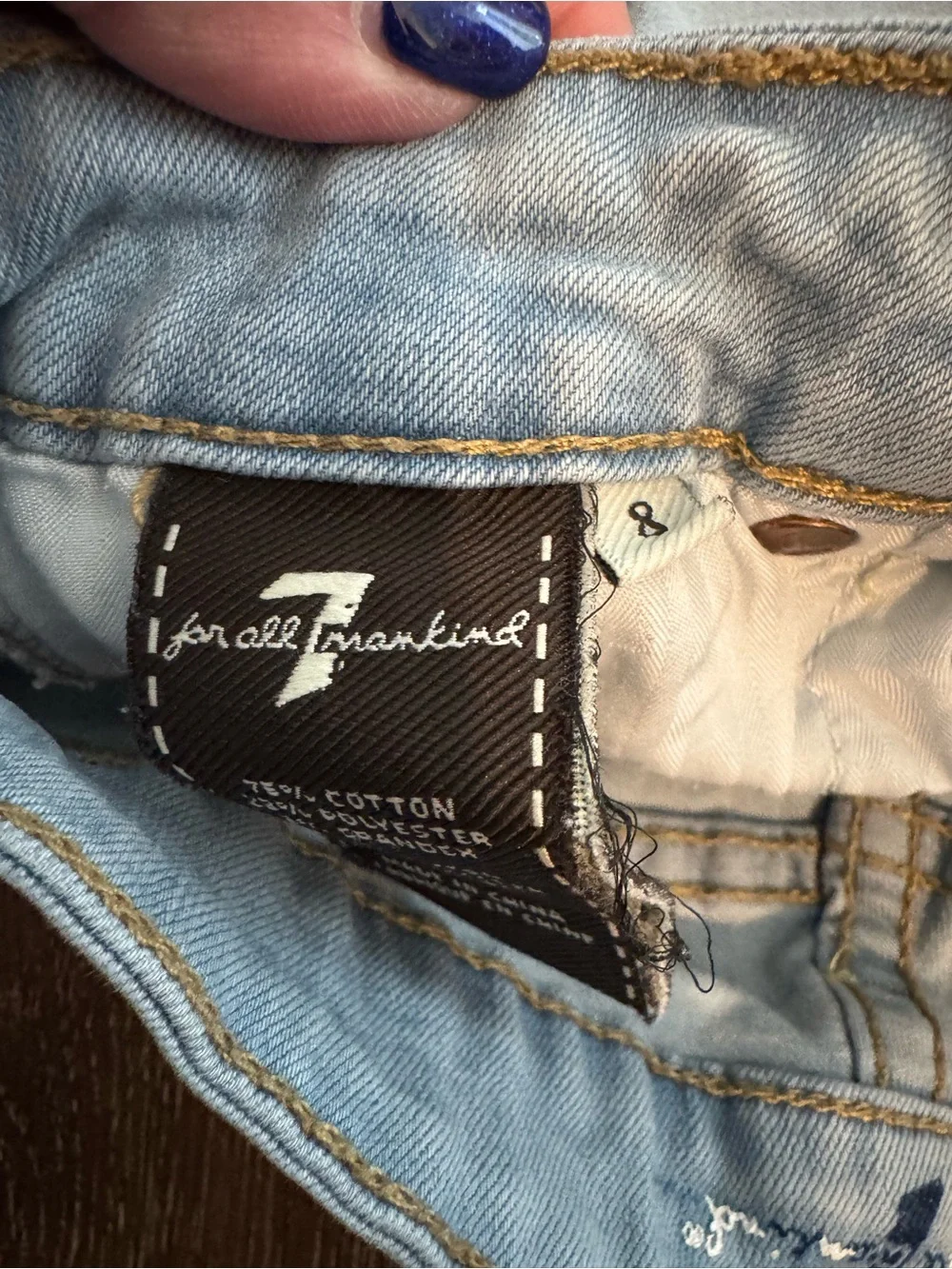 Light Wash Distressed Denim Shorts